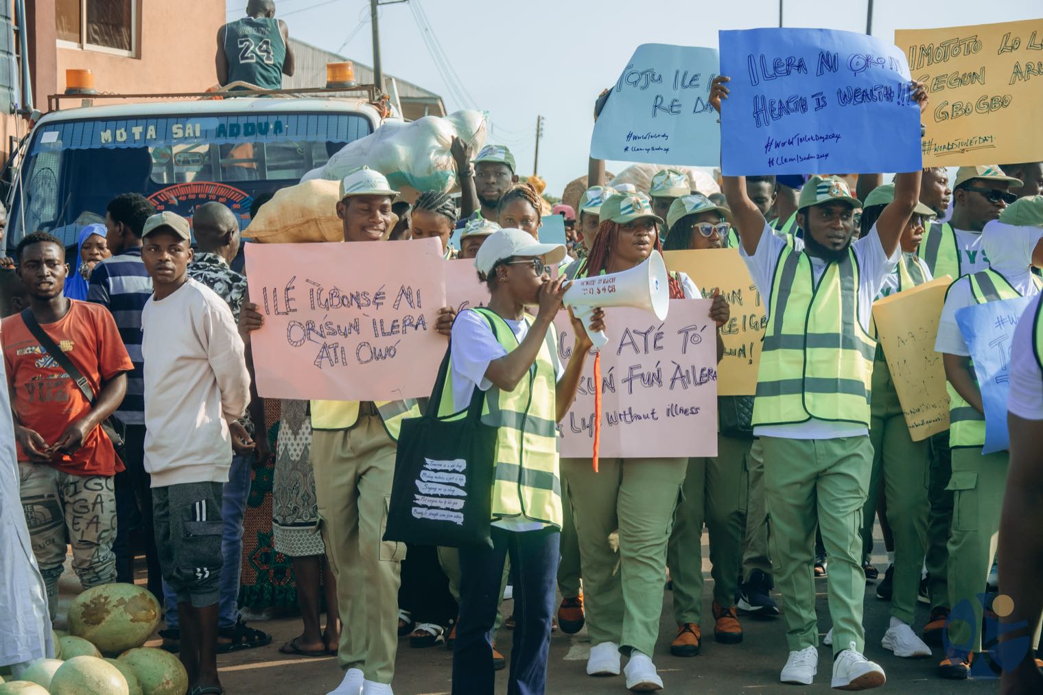 Leading a World Toilet Day sanitation march with a megaphone